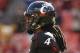 LANDOVER, MD - SEPTEMBER 29: Quarterback Munchie Legaux #4 of the Cincinnati Bearcats walks to the line to run a play against the Virginia Tech Hokies during their NCAA football game at FedExField on September 29, 2012 in Landover, Maryland. (Photo by Jonathan Ernst/Getty Images)