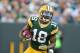GREEN BAY, WI - SEPTEMBER 09: Randall Cobb #18 of the Green Bay Packers returns a punt for a touchdown during the NFL season opener against the San Francisco 49ers at Lambeau Field on September 9, 2012 in Green Bay, Wisconsin. (Photo by Andy Lyons/Getty Images)