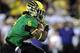 EUGENE, OR - OCTOBER 6: Running back De'Anthony Thomas #6 of the Oregon Ducks heads to the end zone and a touchdown during the first quarter of the game against the Washington Huskies on October 6, 2012 at Autzen Stadium in Eugene, Oregon. (Photo by Steve Dykes/Getty Images)