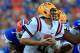 GAINESVILLE, FL - OCTOBER 06: Jon Bostic #1 of the Florida Gators tackles Zach Mettenberger #8 of the LSU Tigers during the game at Ben Hill Griffin Stadium on October 6, 2012 in Gainesville, Florida. (Photo by Sam Greenwood/Getty Images)