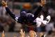 Sadaharu Oh, the manager of the Japan team for the World Baseball Classic, being thrown in the air by his players after defeating Cuba for the championship