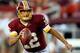 LANDOVER, MD - AUGUST 29: Quarterback Kirk Cousins #12 of the Washington Redskins looks to pass against the Tampa Bay Buccaneers at FedExField on August 29, 2012 in Landover, Maryland. (Photo by Rob Carr/Getty Images)
