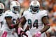 CINCINNATI, OH - OCTOBER 07: Defensive tackle Randy Starks #94 of the Miami Dolphins celebrates after an interception with Karlos Dansby #58 against the Cincinnati Bengals at Paul Brown Stadium on October 7, 2012 in Cincinnati, Ohio. (Photo by Matt Sullivan/Getty Images)
