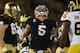 SOUTH BEND, IN - SEPTEMBER 22: Manti Te'o #5 of the Notre Dame Fighting Irish celebrates a sack against Denard Robinson #16 of the Michigan Wolverines at Notre Dame Stadium on September 22, 2012 in South Bend, Indiana. Notre Dame defeated Michigan 13-6. (Photo by Jonathan Daniel/Getty Images)