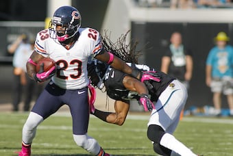 Devin Hester pulls away from a Jacksonville defender