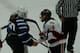 Melanie Fournier and Alex Yallouz in a postgame handshake