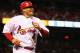 ST. LOUIS, MO - OCTOBER 1: Yadier Molina #4 of the St. Louis Cardinals returns to the dugout after scoring a run against the Cincinnati Reds at Busch Stadium on October 1, 2012 in St. Louis, Missouri. (Photo by Dilip Vishwanat/Getty Images)