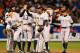 BALTIMORE, MD - OCTOBER 07: (L-R) Brett Gardner #11, Mark Teixeira #25, Alex Rodriguez #13, Curtis Granderson #14, Derek Jeter #2 and Ichiro Suzuki #31 of the New York Yankees celebrate after they won 7-2 against the Baltimore Orioles during Game One of the American League Division Series at Oriole Park at Camden Yards on October 7, 2012 in Baltimore, Maryland. (Photo by Rob Carr/Getty Images)
