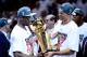 MIAMI, FL - JUNE 21: (L-R) Dwyane Wade #3 and Shane Battier #31 of the Miami Heat celebrate with the Larry O'Brien Championship trophy after they won 121-106 against the Oklahoma City Thunder in Game Five of the 2012 NBA Finals on June 21, 2012 at American Airlines Arena in Miami, Florida. NOTE TO USER: User expressly acknowledges and agrees that, by downloading and or using this photograph, User is consenting to the terms and conditions of the Getty Images License Agreement. (Photo by Ronald Martinez/Getty Images)