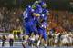 BOISE, ID - SEPTEMBER 20: Michael Atkinson #99, Demarcus Lawrence #8, and Bryan Douglas #1 of the Boise State Broncos celebrate after a play against the BYU Cougars at Bronco Stadium on September 20, 2012 in Boise, Idaho. (Photo by Otto Kitsinger III/Getty Images)