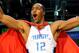PHOENIX - FEBRUARY 14: Dwight Howard of the Orlando Magic emerges from a phone booth wearing a Superman cape during the Sprite Slam Dunk Contest on All-Star Saturday Night, part of 2009 NBA All-Star Weekend at US Airways Center on February 14, 2009 in Phoenix, Arizona. NOTE TO USER: User expressly acknowledges and agrees that, by downloading and or using this photograph, User is consenting to the terms and conditions of the Getty Images License Agreement. (Photo by Ronald Martinez/Getty Images)