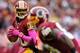 LANDOVER, MD - OCTOBER 07: Quarterback Robert Griffin III #10 of the Washington Redskins looks for an open teammate against the Atlanta Falcons in the first quarter at FedExField on October 7, 2012 in Landover, Maryland. (Photo by Patrick Smith/Getty Images)