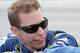 TALLADEGA, AL - OCTOBER 07: Brad Keselowski, driver of the #2 Miller Lite Dodge, smiles on the grid prior to the start of the NASCAR Sprint Cup Series Good Sam Roadside Assistance 500 at Talladega Superspeedway on October 7, 2012 in Talladega, Alabama. (Photo by Jerry Markland/Getty Images for NASCAR)