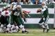 EAST RUTHERFORD, NJ - NOVEMBER 21: Mark Sanchez #6 of the New York Jets in action against the Houston Texans on November 21, 2010 at the New Meadowlands Stadium in East Rutherford, New Jersey. (Photo by Jim McIsaac/Getty Images)