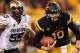 TEMPE, AZ - OCTOBER 29: Quarterback Taylor Kelly #10 of the Arizona State Sun Devils rushes the football past David Goldberg #55 of the Colorado Buffaloes during the college football game at Sun Devil Stadium on October 29, 2011 in Tempe, Arizona. The Sun Devils defeated the Buffaloes 48-14. (Photo by Christian Petersen/Getty Images)
