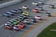 Drivers race in tight packs at Talladega.