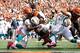 CINCINNATI, OH - OCTOBER 07: Safety's Reshad Jones, #30 and Chris Clemons, #20 of the Miami Dolphins, stop BenJarvus Green-Ellis, #42 of the Cincinnati Bengals, during the game at Paul Brown Stadium on October 7, 2012 in Cincinnati, Ohio. (Photo by Tyler Barrick/Getty Images)