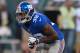 EAST RUTHERFORD, NJ - AUGUST 18: Will Hill #38 of the New York Giants runs before the preseason game against the New York Jets at Metlife Stadium on August 18, 2012 in East Rutherford, New Jersey. (Photo by Drew Hallowell/Getty Images)