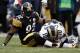 PITTSBURGH, PA - DECEMBER 24: James Harrison #92 of the Pittsburgh Steelers sits on the field after sacking Kellen Clemens #10 of the St. Louis Rams after during the Christmas Eve game on December 24, 2011 at Heinz Field in Pittsburgh, Pennsylvania. (Photo by Jared Wickerham/Getty Images)