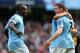 MANCHESTER, ENGLAND - OCTOBER 06: James Milner of Manchester City celebrates scoring his team's third goal with team-mate Micah Richards (L) during the Barclays Premier League match between Manchester City and Sunderland at the Etihad Stadium on October 6, 2012 in Manchester, England. (Photo by Alex Livesey/Getty Images)