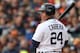 DETROIT, MI - OCTOBER 07: Miguel Cabrera #24 of the Detroit Tigers checks with the third base coach during the seventh inning of Game Two of the American League Division Series against the Oakland Athletics at Comerica Park on October 7, 2012 in Detroit, Michigan. The Tigers defeated the Athletics 5-4. (Photo by Leon Halip/Getty Images)