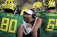 EUGENE, OR - OCTOBER 6: Head coach Chip Kelly of the Oregon Ducks speaks with his team during a timeout during the third quarter of the game against the Washington Huskies on October 6, 2012 at Autzen Stadium in Eugene, Oregon. Oregon won the game 52-21. (Photo by Steve Dykes/Getty Images)