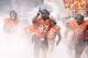 STILLWATER, OK - SEPTEMBER 29: The Oklahoma State Cowboys take the field before the game against the Texas Longhorns on September 29, 2012 at Boone Pickens Stadium in Stillwater, Oklahoma. Texas defeated Oklahoma State 41-36. (Photo by Brett Deering/Getty Images)