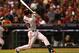 CINCINNATI, OH - OCTOBER 09: Buster Posey #28 of the San Francisco Giants hits a single in the 10th inning against the Cincinnati Reds in Game Three of the National League Division Series at the Great American Ball Park on October 9, 2012 in Cincinnati, Ohio. (Photo by Jonathan Daniel/Getty Images)