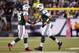 Oct. 8, 2012; East Rutherford, NJ, USA; New York Jets backup quarterback Tim Tebow (15) high fives quarterback Mark Sanchez (6) during the game against the Houston Texans at MetLife Stadium. Mandatory Credit: Andrew Mills/THE STAR-LEDGER via US PRESSWIRE