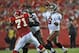 KANSAS CITY, MO - AUGUST 12: Quarterback Josh Freeman #5 of the Tampa Bay Buccaneers throws a pass against pressure from defensive end Allen Bailey #71 of the Kansas City Chiefs during the first half on August 12, 2011 at Arrowhead Stadium in Kansas City, Missouri. (Photo by Peter Aiken/Getty Images)