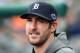 DETROIT, MI - OCTOBER 07: Justin Verlander #35 of the Detroit Tigers looks on from the dugout against the Oakland Athletics during Game Two of the American League Division Series at Comerica Park on October 7, 2012 in Detroit, Michigan. (Photo by Leon Halip/Getty Images)