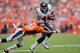 DENVER, CO - SEPTEMBER 23: Running back Ben Tate #44 of the Houston Texans runs with the ball as safety Rahim Moore #26 of the Denver Broncos tries to make the tackle during the third quarter at Sports Authority Field Field at Mile High on September 23, 2012 in Denver, Colorado. The Texans defeated the Broncos 31-25. (Photo by Justin Edmonds/Getty Images)