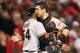Sergio Romo and Buster Posey congratulating each other after Game 3 victory.
