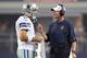 Aug 25, 2012; Arlington, TX, USA; Dallas Cowboys quarterback Tony Romo (9) talks with head coach Jason Garrett during the game against the St Louis Rams at Cowboys Stadium. Mandatory Credit: Matthew Emmons-US PRESSWIRE