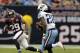 HOUSTON, TX - SEPTEMBER 30: Chris Johnson #28 of the Tennessee Titans looks for room to run against the Houston Texans at Reliant Arena at Reliant Park on September 30, 2012 in Houston, Texas. (Photo by Bob Levey/Getty Images)