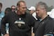 May 6, 2012; Jacksonville FL, USA; Jacksonville Jaguars head coach Mike Mularkey talks with general manager Gene Smith before the start of rookie mini camp at Florida Blue Health & Wellness Practice Fields. Mandatory Credit: Phil Sears-US PRESSWIRE