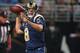 ST. LOUIS, MO - OCTOBER 4: Sam Bradford #8 of the St. Louis Rams passes against the Arizona Cardinals at the Edward Jones Dome on October 4, 2012 in St. Louis, Missouri. (Photo by Dilip Vishwanat/Getty Images)