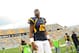 Sep 1, 2012; Morgantown, WV, USA; West Virginia Mountaineers quarterback Geno Smith (12) after defeating the Marshall Thundering Herd 69-34 at Milan Puskar Stadium. Mandatory Credit: James Lang-US PRESSWIRE