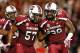 COLUMBIA, SC - OCTOBER 06: Aldrick Fordham #57 of the South Carolina Gamecocks celebrates with Chaz Sutton #90 after Sutton's sack on Aaron Murray #11 of the Georgia Bulldogs at Williams-Brice Stadium on October 6, 2012 in Columbia, South Carolina. (Photo by Kevin C. Cox/Getty Images)