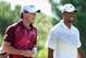 ANTALYA, TURKEY - OCTOBER 11: Rory McIlroy of Northern Ireland and Tiger Woods of the USA share a joke on day three of the Turkish Airlines World Golf Final at the Antalya GC on October 11, 2012 in Antalya, Turkey. (Photo by Warren Little/Getty Images)