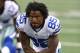 Sep 23, 2012; Arlington, TX, USA; Dallas Cowboys receiver Kevin Ogletree (85) stretches prior to the game against the Tampa Bay Buccaneers at Cowboys Stadium. Mandatory Credit: Matthew Emmons-US PRESSWIRE
