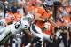 Sep 30, 2012; Stanford, CA, USA; Denver Broncos tight end Jacob Tamme (84) is pursued by Oakland Raiders safety Tyvon Branch (33) at Sports Authority Field at Mile High. Mandatory Credit: Kirby Lee/Image of Sport-US PRESSWIRE