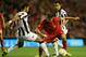 LIVERPOOL, ENGLAND - OCTOBER 04: Fabio Borini of Liverpool competes with Medhi Benatia of Udinese Calcio during the UEFA Europa League Group A match between Liverpool and Udinese at Anfield on October 4, 2012 in Liverpool, England. (Photo by Clive Brunskill/Getty Images)