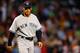 BOSTON, MA - SEPTEMBER 11: Manager Joe Girardi #28 of the New York Yankees walks back to the dugout after a pitching change against the Boston Red Sox during the game on September 11, 2012 at Fenway Park in Boston, Massachusetts. (Photo by Jared Wickerham/Getty Images)