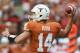 AUSTIN, TX - OCTOBER 06: David Ash #14 of the Texas Longhorns throws the ball against the West Virginia Mountaineers at Darrell K Royal-Texas Memorial Stadium on October 6, 2012 in Austin, Texas. (Photo by Ronald Martinez/Getty Images)