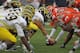 CHAMPAIGN, IL - NOVEMBER 12: David Molk #50 of the Michigan Wolverines prepares to snap the ball against the Illinois Fighting Illini defense at Memorial Stadium on November 12, 2011 in Champaign, Illinois. Michigan defeated Illinois 31-14. (Photo by Jonathan Daniel/Getty Images)