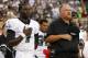PHILADELPHIA, PA - AUGUST 09: Michael Vick #7 and head coach Andy Reid of the Philadelphia Eagles observe a moment of silence in memory of Reid's son Garrett before a preseason game against the Pittsburgh Steelers at Lincoln Financial Field on August 9, 2012 in Philadelphia, Pennsylvania. (Photo by Jeff Zelevansky/Getty Images)