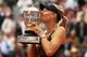 PARIS, FRANCE - JUNE 09: Maria Sharapova of Russia kisses the Coupe Suzanne Lenglen after the women's singles final against Sara Errani of Italy during day 14 of the French Open at Roland Garros on June 9, 2012 in Paris, France. (Photo by Matthew Stockman/Getty Images)