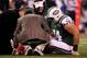 EAST RUTHERFORD, NJ - OCTOBER 08: Nick Mangold #74 of the New York Jets is tended to after he was injured against the New York Jets at MetLife Stadium on October 8, 2012 in East Rutherford, New Jersey. (Photo by Alex Trautwig/Getty Images)