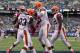 EAST RUTHERFORD, NJ - OCTOBER 07: Trent Richardson #33 of the Cleveland Browns is congratulated by teammates Josh Gordon #13 and Benjamin Watson #82 after Richardson scored a touchdown in the first quarter against the New York Giants on October 7, 2012 at MetLife Stadium in East Rutherford, New Jersey. (Photo by Elsa/Getty Images)